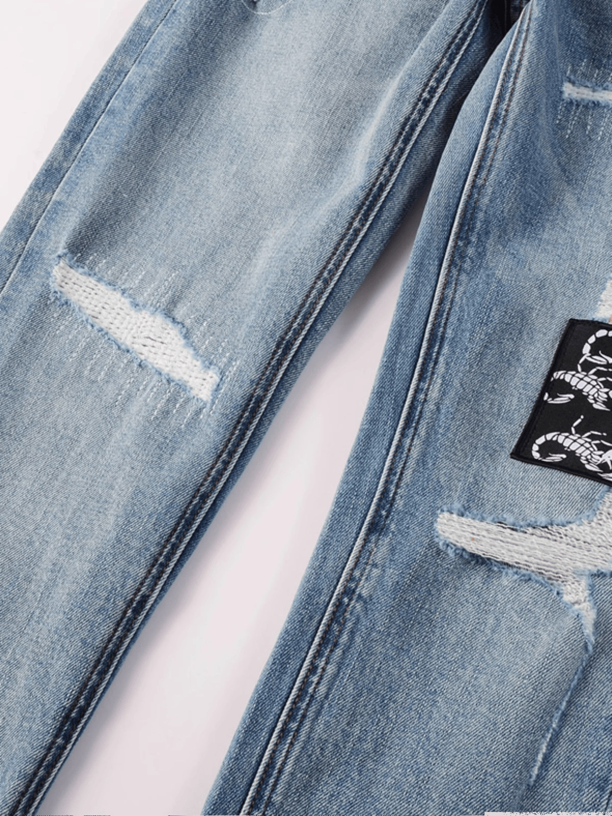 Blue Patch Ripped Jeans