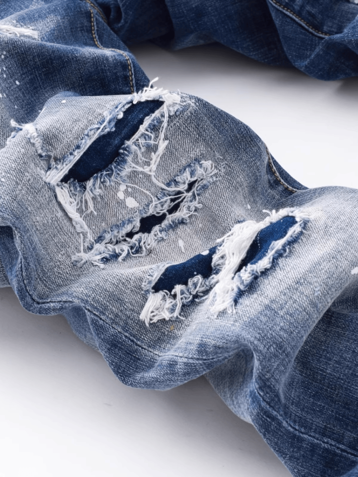 White Blue Washed Paint Jeans