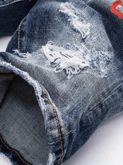 Washed Blue Ripped Jeans
