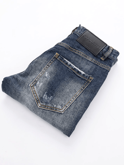 Washed Blue Ripped Jeans